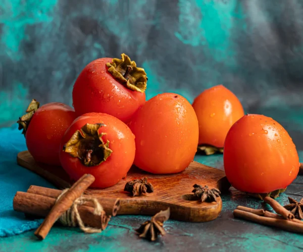 persimmon-on-a-dark-background-fresh-ripe-fruits-2026-01-07-00-30-56-utc persimmon-on-a-dark-background-fresh-ripe-fruits-2026-01-07-00-30-56-utc
