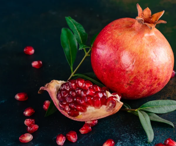 tasty-fresh-red-pomegranate-on-a-dark-concrete-bac-2026-01-07-00-01-34-utc tasty-fresh-red-pomegranate-on-a-dark-concrete-bac-2026-01-07-00-01-34-utc